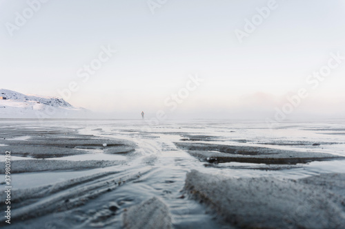 a lone traveler far from the shore came to the bottom of the North sea at low tide on a frosty winter day