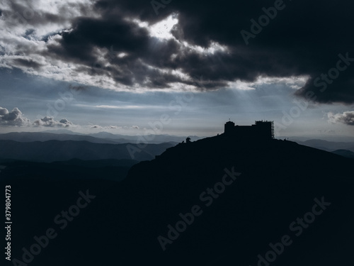 shadow of castle on the hill with dark sky
