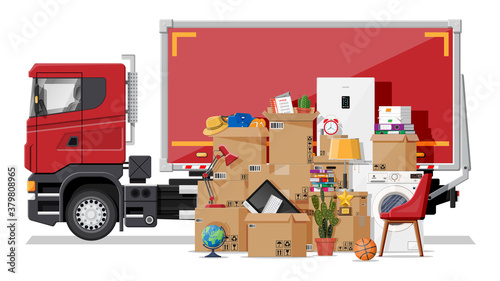 Delivery truck full of household items. Moving to new house. Family relocated to new home. Boxes with goods. Package transportation. Electronics clothes appliances furniture. Flat vector illustration