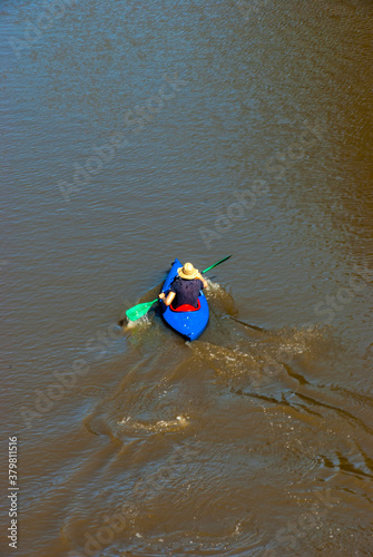 Blue Kayak Going Away vert
