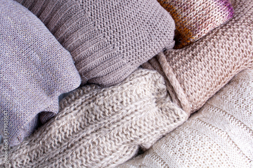 Background texture of knitted sweaters. Winter autumn