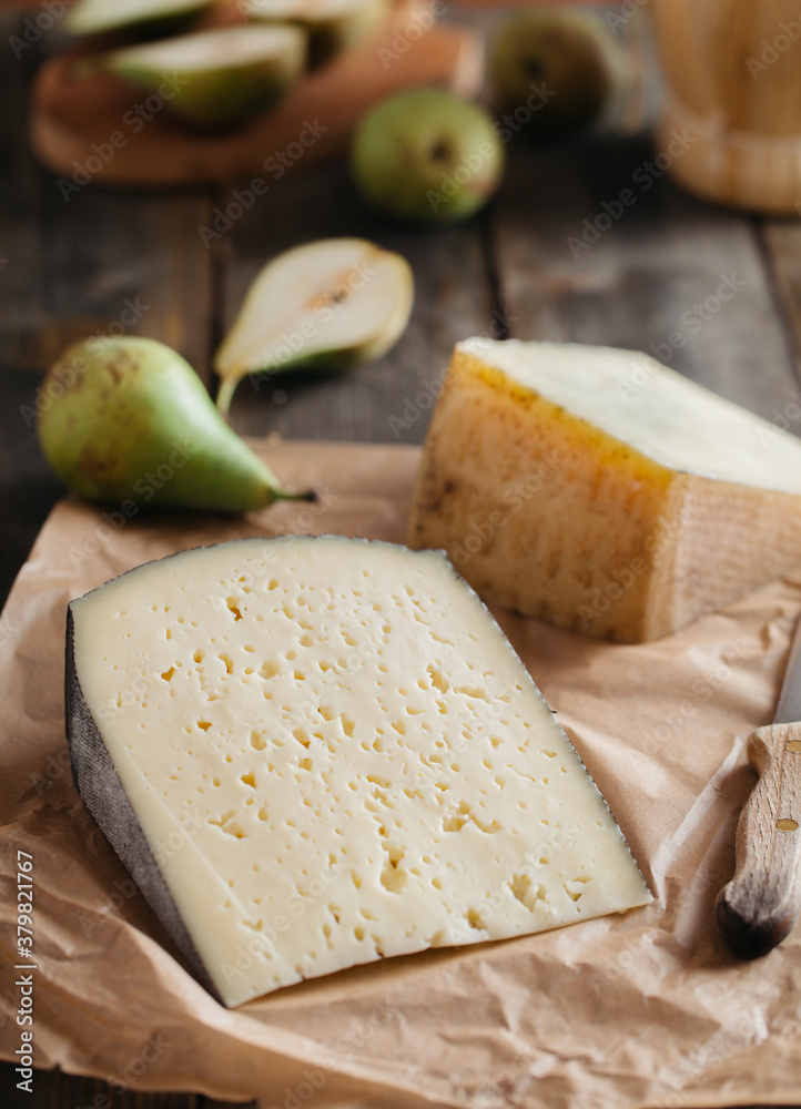 Cheese and pears on the table Cheese and pears on the table