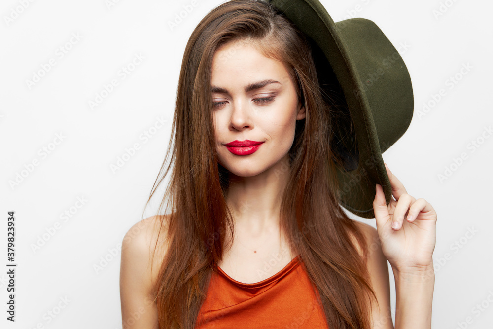 Woman holding hat Closed eyes smile fashion near face red sundress Woman holding hat Closed eyes smile fashion near face red sundress