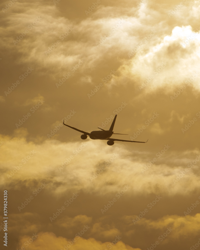 Silhouette of an airplane at sunset. Silhouette of an airplane at sunset.