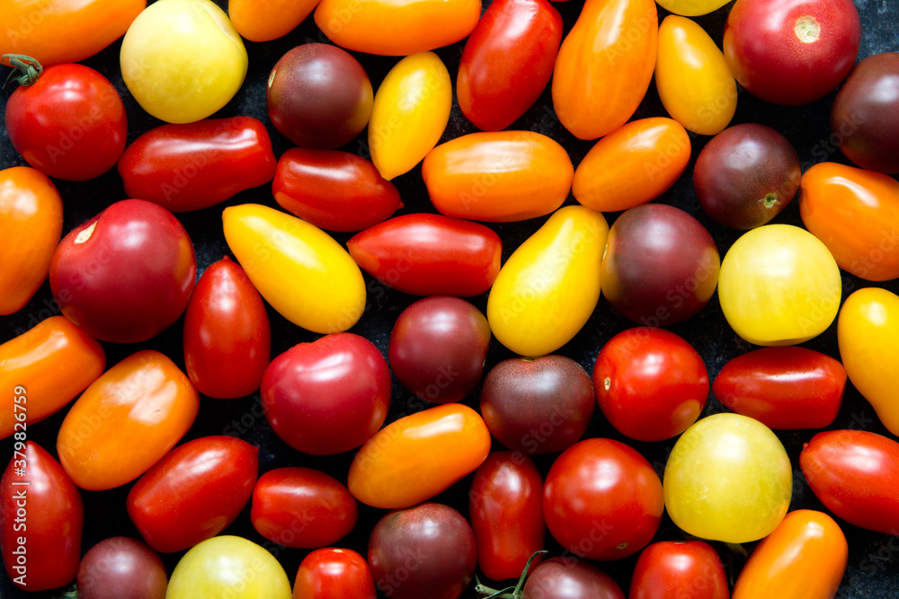 Colorful cherry tomatoes background Colorful cherry tomatoes background