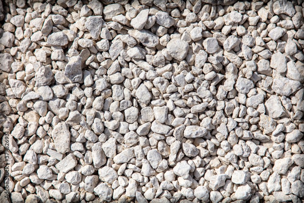Stone gravel at a construction site as a background. Stone gravel at a construction site as a background.