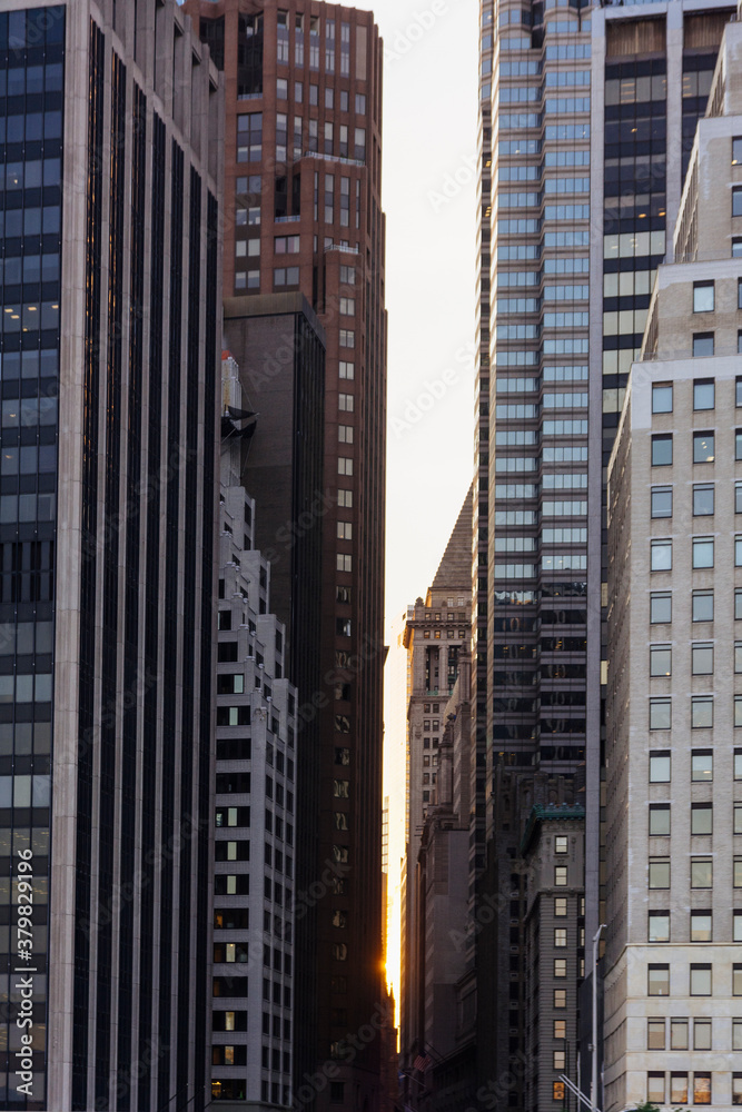 Sun setting behind buildings. New York City Sun setting behind buildings. New York City