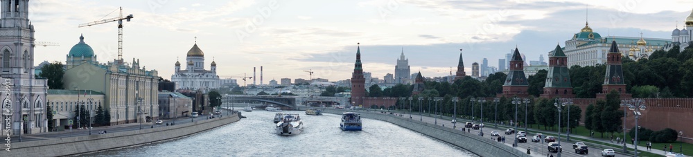 Obraz premium MOSCOW, Russia - August 2020: Panoramic view of the Kremlin, Moscow River and the wall of the Moscow Kremlin. Main attractions of the capital