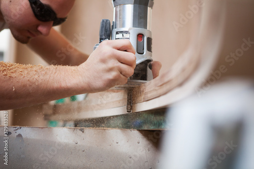 Woodworking: Carpenter Using Router photo