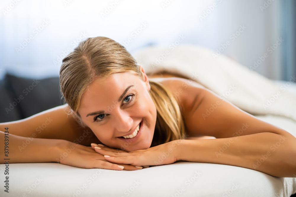Beautiful woman is relaxing massage at her home. Stress relief after work.
Beautiful woman is relaxing massage at her home. Stress relief after work.