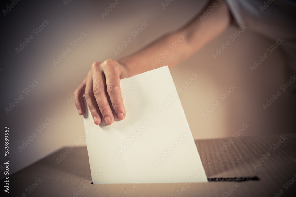 Conceptual image of a person voting during elections Conceptual image of a person voting during elections