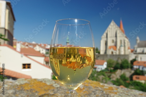 Reflection through a glass of wine in Znojmo city, Czech Republic photo