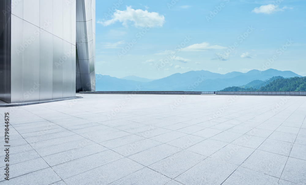 Empty concrete tiles floor with modern architecture and beautiful landscape - obrazy, fototapety, plakaty 