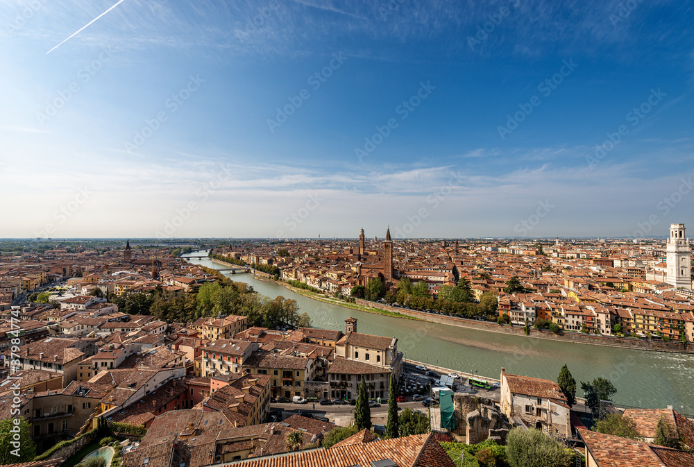 Verona cityscape seen from the hill at summer with the River Adige, Lamberti Tower, Church of Santa Anastasia and the Cathedral. UNESCO world heritage site. Veneto, Italy, Europe
