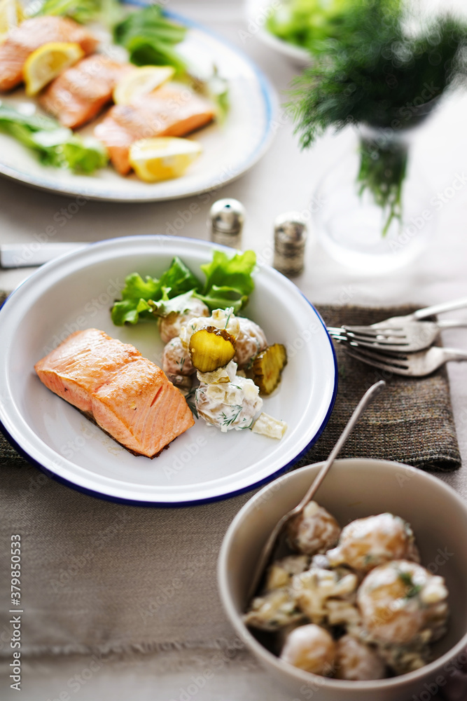 Roasted wild Scottish salmon fillet with dill pickle potato salad. Roasted wild Scottish salmon fillet with dill pickle potato salad.