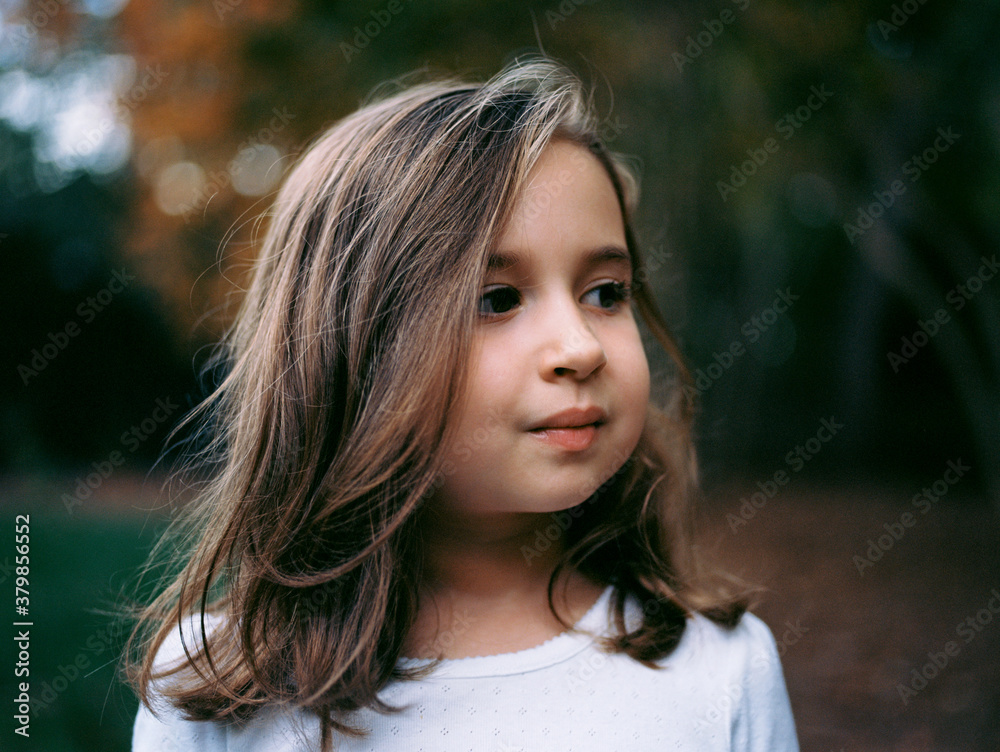 Portrait of a beautiful young girl looking away Portrait of a beautiful young girl looking away