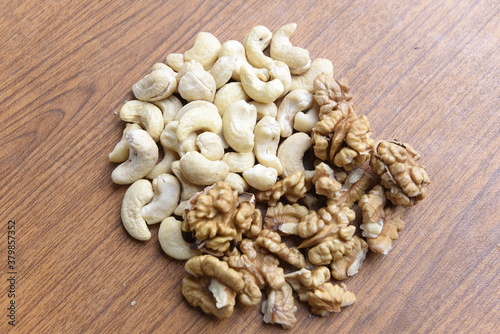 Cashew Nut and walnut on wood