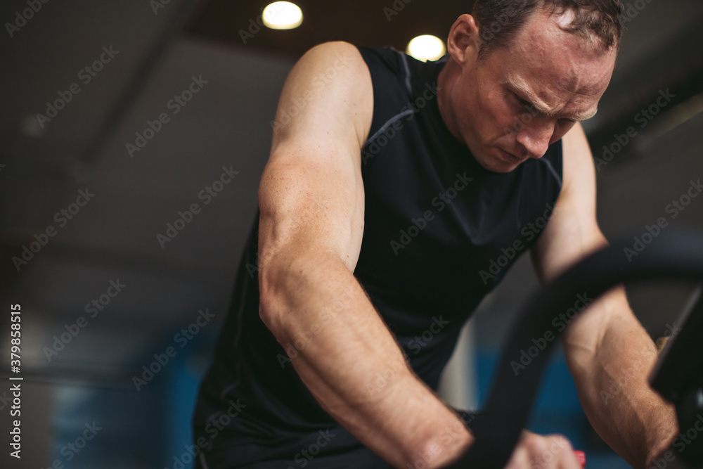 Group of people in spin class together Group of people in spin class together