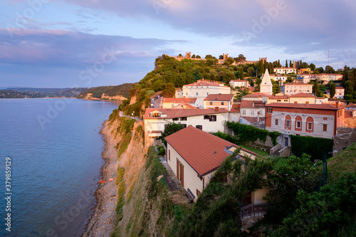 houses on the cliff above the sea, piran, slovenia