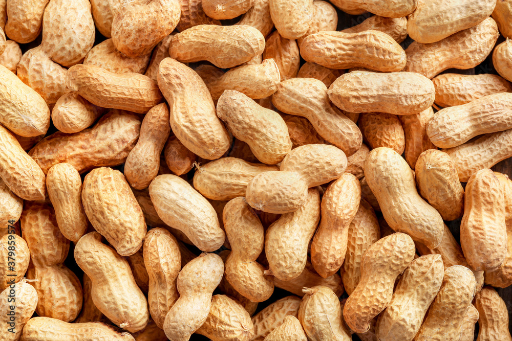 Tasty peanuts in pods background Tasty peanuts in pods background