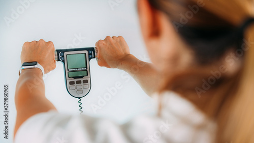 Obraz na płótnie Using Body Impedance Monitor at Home