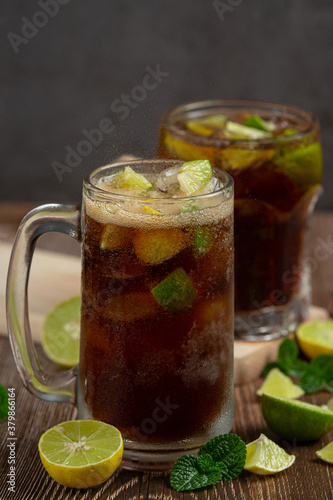 Beautiful cold drink of cola with Ice cubes