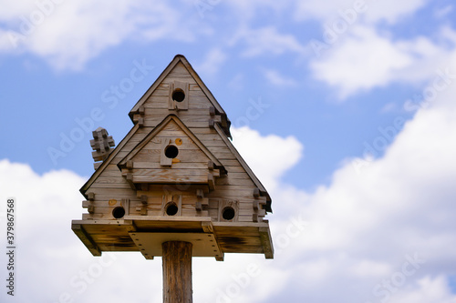 birdhouse made of wood in the forest