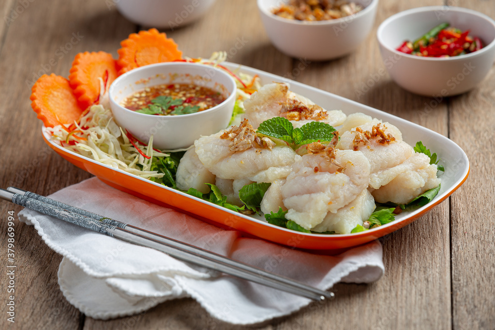 Boiled dolly fish with spicy seafood sauce. Boiled dolly fish with spicy seafood sauce.