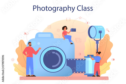 Photography school course. Professional photographer teaching kid