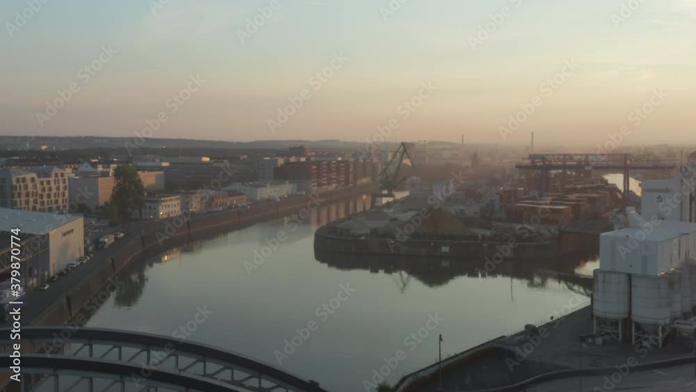 Cargo Port Area on River in Early morning haze, no traffic in Frankfurt am Main, Germany Cargo Port Area on River in Early morning haze, no traffic in Frankfurt am Main, Germany