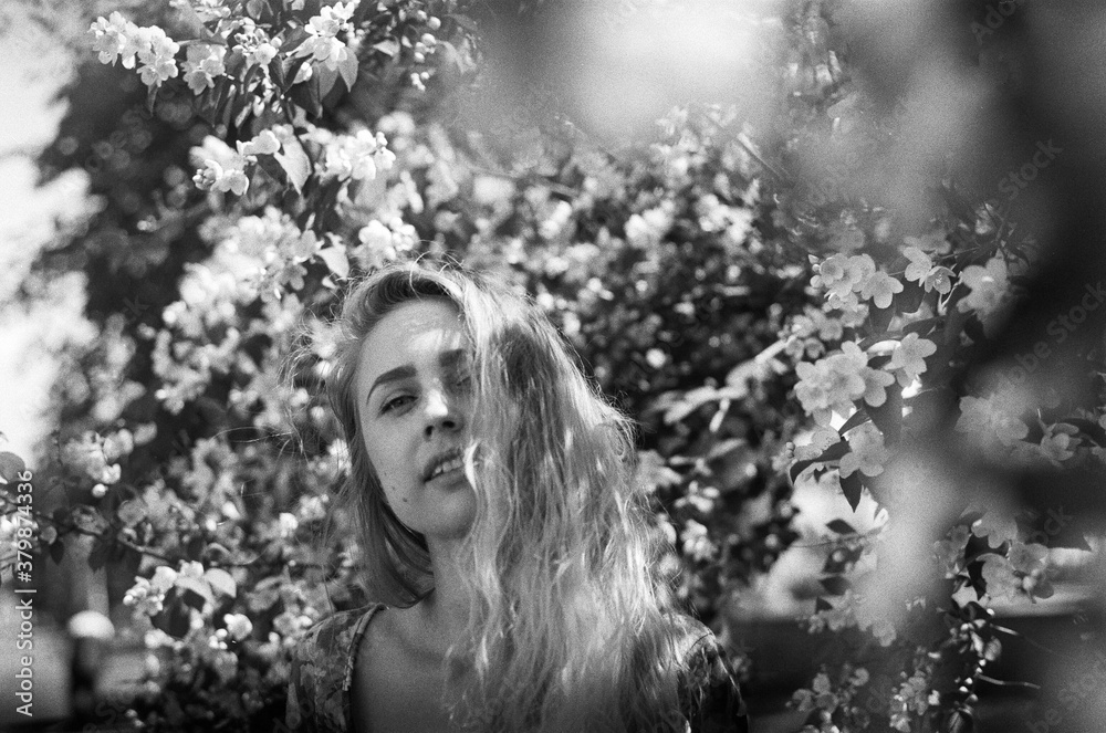 A portrait of a woman in the flowers A portrait of a woman in the flowers
