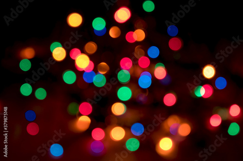 Festive blurred bokeh background, bright circles, defocused, lights