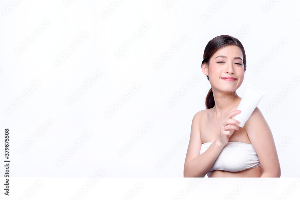 Portrait of beautiful charming young Asian woman posing facial with cosmetic and sitting with white table, beauty of female face with skincare on white background, healthcare and skin care concept. Portrait of beautiful charming young Asian woman posing facial with cosmetic and sitting with white table, beauty of female face with skincare on white background, healthcare and skin care concept.