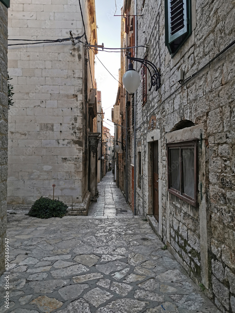Tourist city by the Adratic sea - Sibenik, Croatia. The old stones, narrow street and stairs