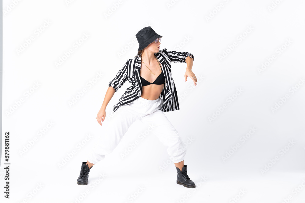 Woman dancing over isolated white background Woman dancing over isolated white background