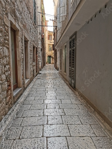 Tourist city by the Adratic sea - Sibenik  Croatia. The old stones  narrow street and stairs