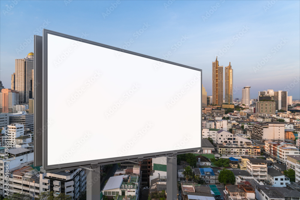 Blank white road billboard with Bangkok cityscape background at sunset. Street advertising poster, mock up, 3D rendering. Side view. The concept of marketing communication to promote or sell idea. Blank white road billboard with Bangkok cityscape background at sunset. Street advertising poster, mock up, 3D rendering. Side view. The concept of marketing communication to promote or sell idea.