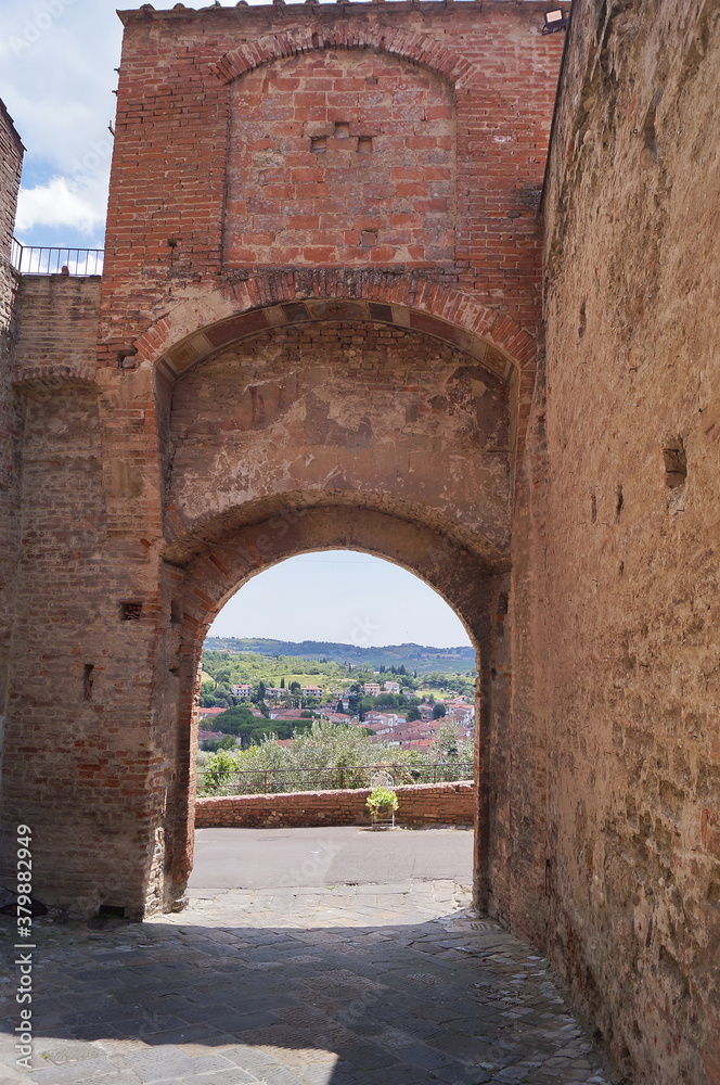 Sun Gate in the ancient medieval village of Certaldo, Tuscany, Italy