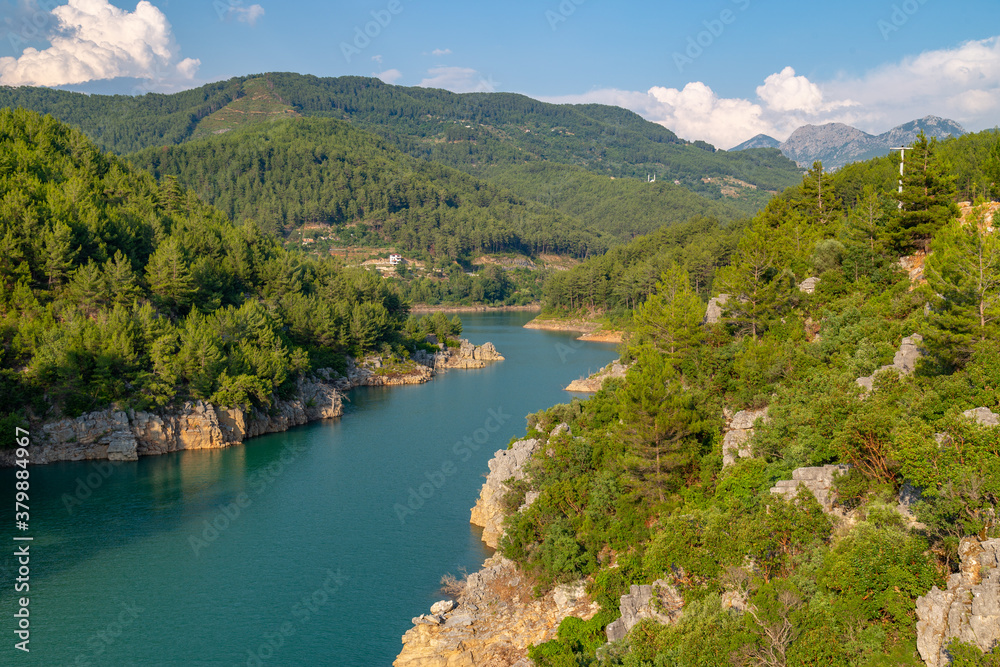 Fototapeta premium Driving through the mountain highway near a beautiful Green Canyon at Antalya province, Turkey.