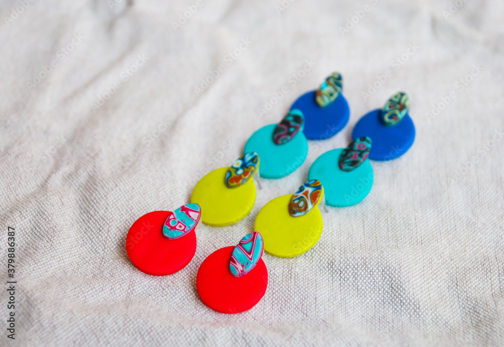Choice of colorful earrings. Bold studs.