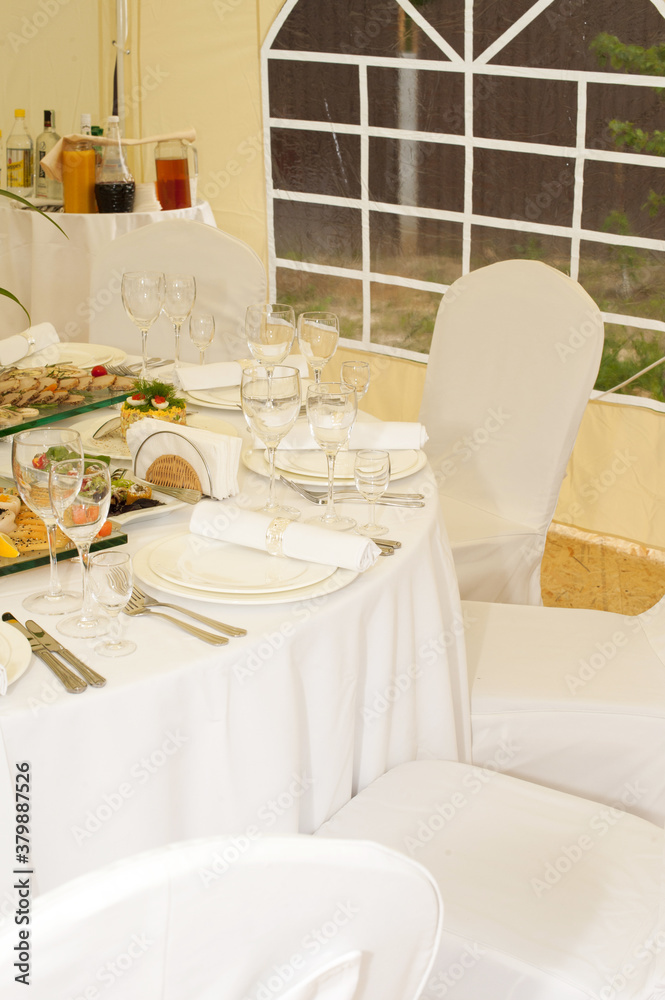 Fototapeta premium Banquet table for a holiday with festive dishes