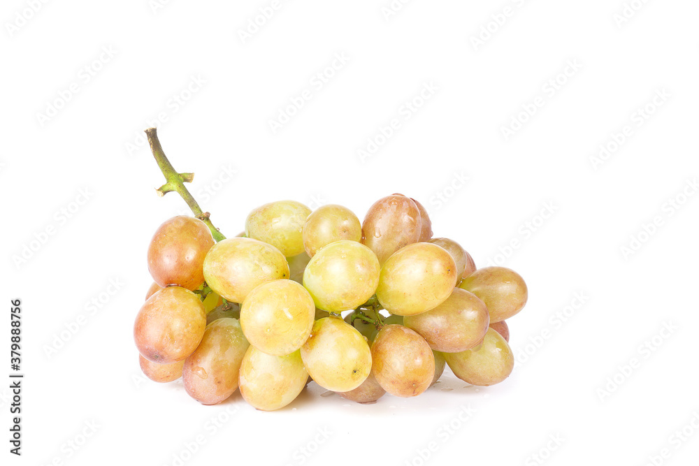 Fresh grapes and water droplets on a white background
