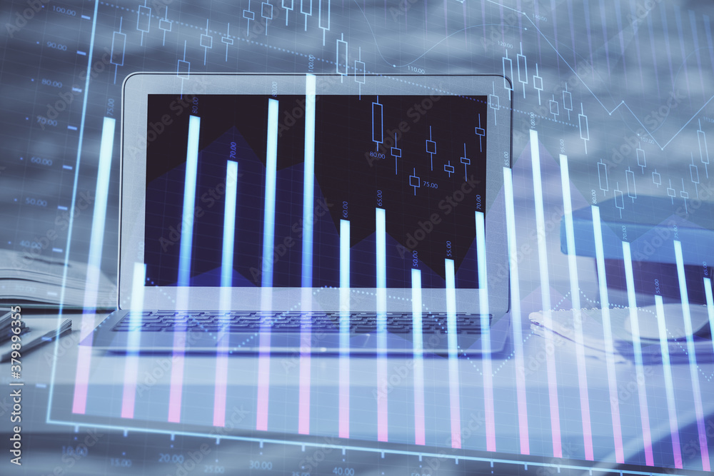 Forex market chart hologram and personal computer background. Double exposure. Concept of investment. Forex market chart hologram and personal computer background. Double exposure. Concept of investment.