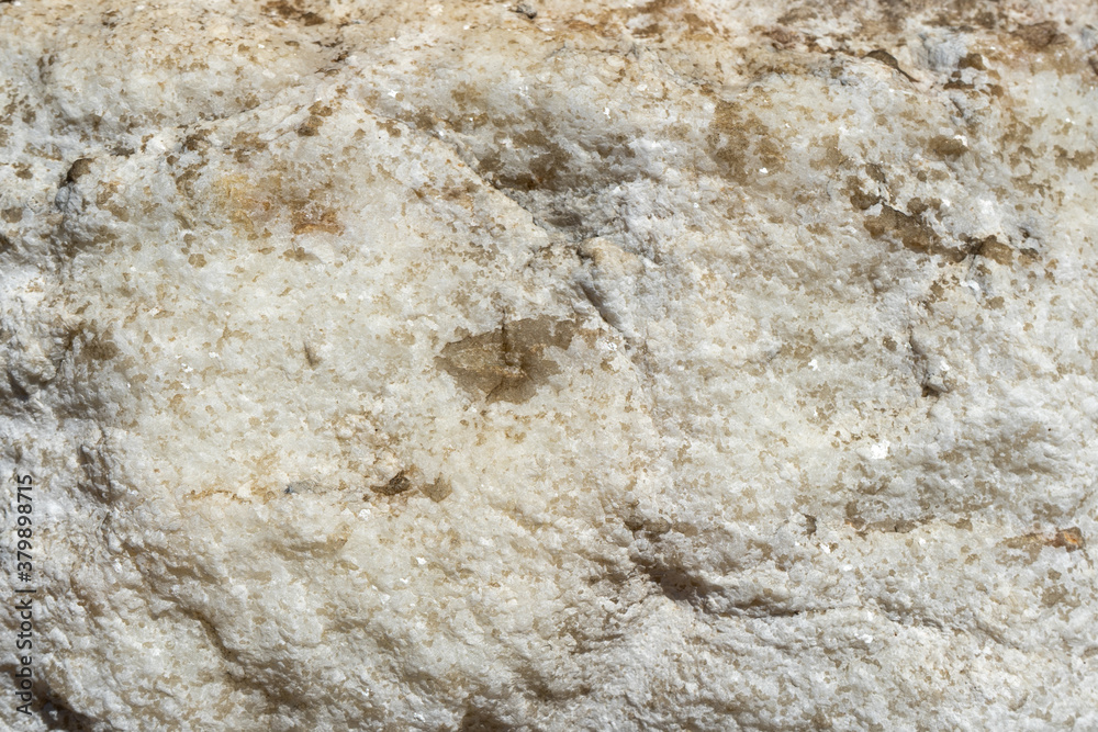 Natural background of light marble with a non-uniform texture Natural background of light marble with a non-uniform texture