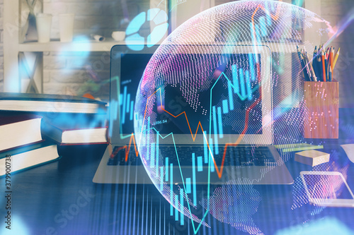 Multi exposure of chart and financial info and work space with computer background. Concept of international online trading.