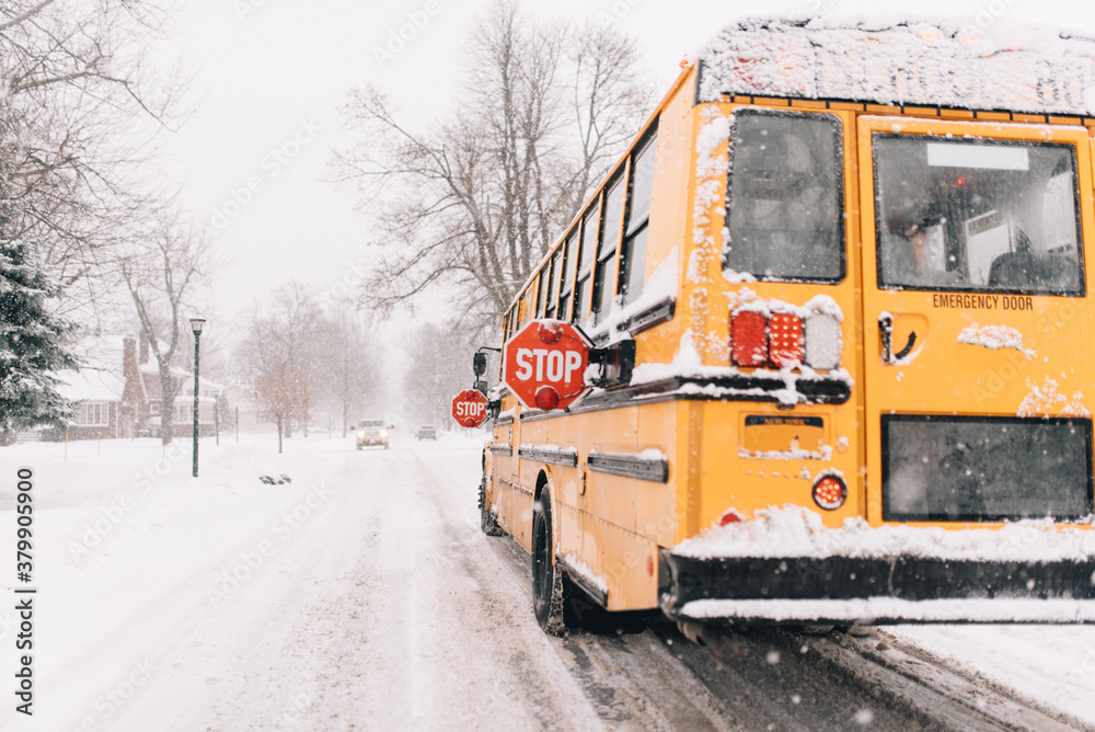 A school bus on a snowy road A school bus on a snowy road