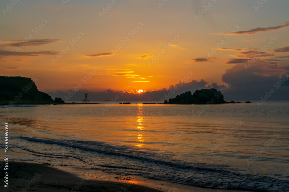 The sun rises on the Black Sea wild beach.