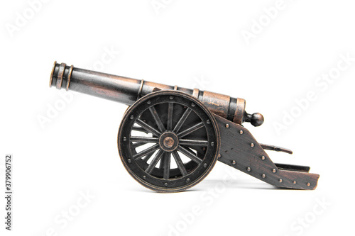 Ancient cannon on wheels isolated on white background.