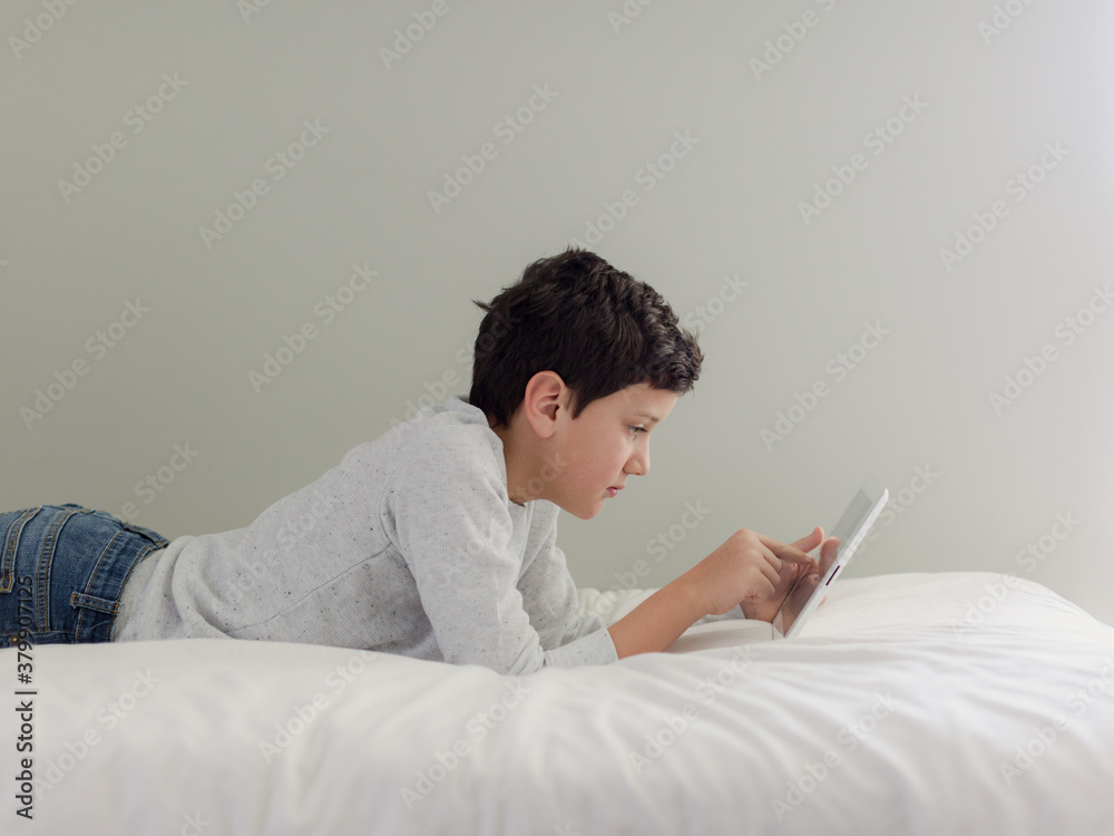 Boy Playing with Tablet Boy Playing with Tablet
