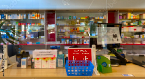 Blurred photo of Medicines arranged in shelves at pharmacy. Pharmacy during Covid-19.